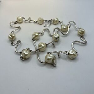 Cecile Jeanne Paris, Faux pearls and silver tone necklace.